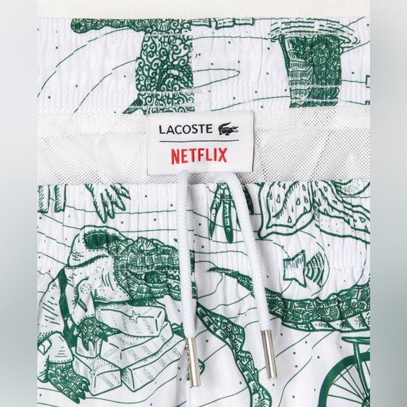 LAST STOCK‼️ MEN’S LACOSTE X NETFLIX PRINTED SWIM TRUNKS - Picture 4 of 8